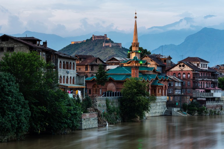 "Srinagar buildings over river, Kashmir, India"